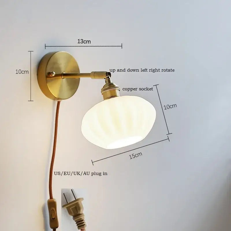 Brass-finished ceramic led wall sconce with adjustable frosted glass shade for bedroom mirror lighting decorbites ceramic led