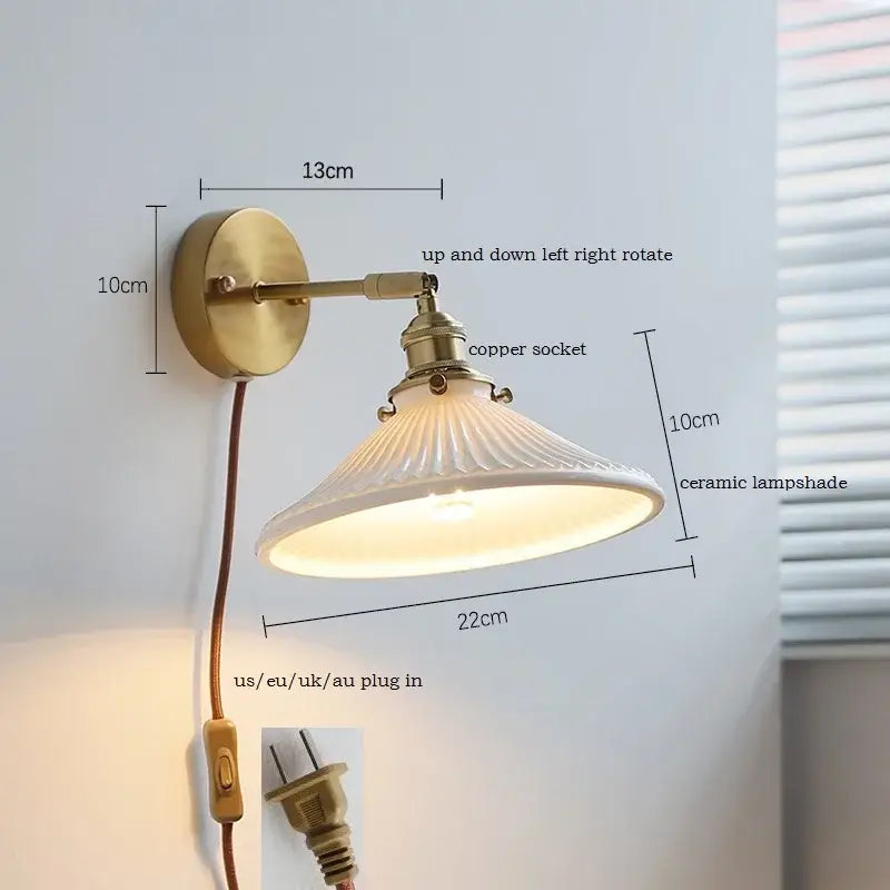 Antique brass led wall sconce with ribbed white ceramic led shade and copper socket for bedroom mirror lighting decorbites ceramic led