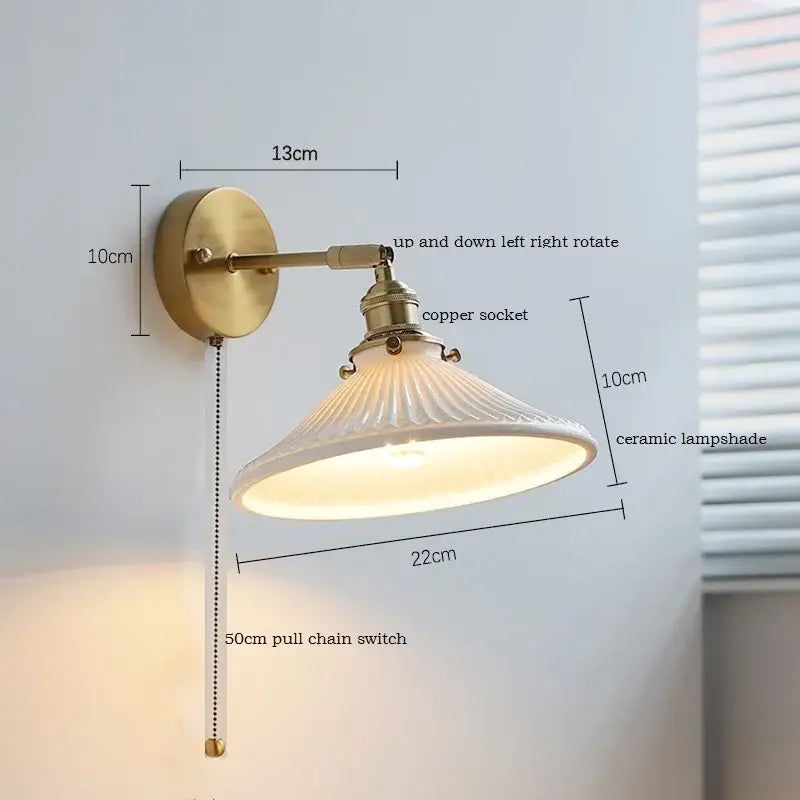 Antique brass finished led wall sconce with ribbed white ceramic lampshade and copper socket by decorbites ceramic led