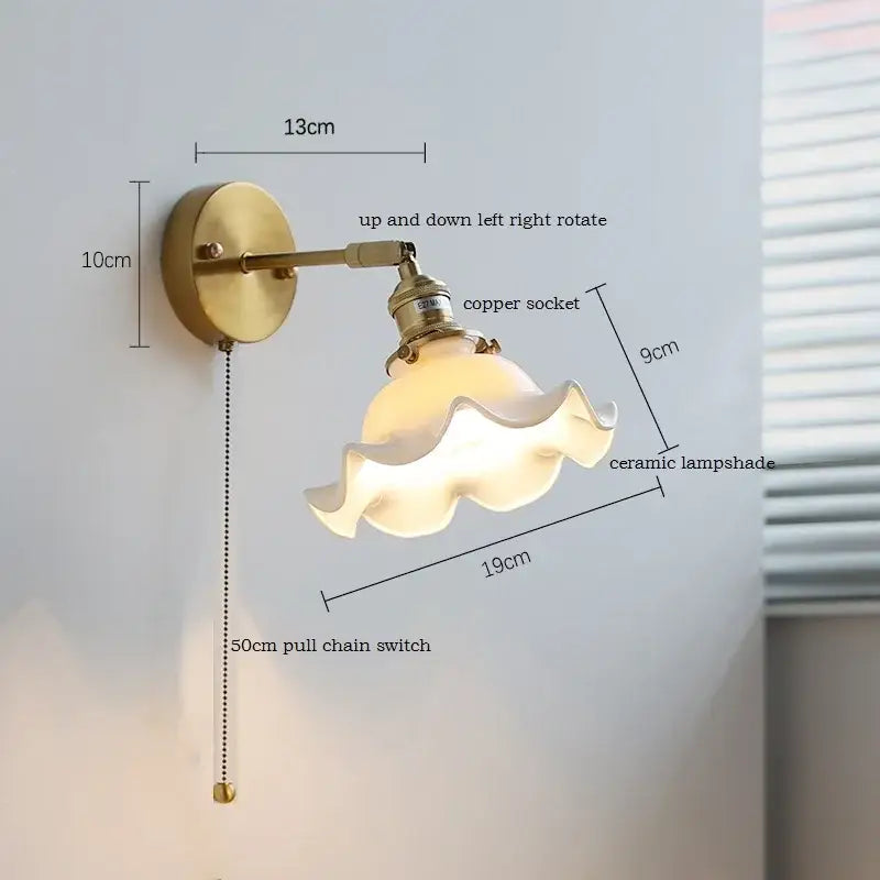 Vintage-style brass ribbed wall sconce with decorbites ceramic lampshade and adjustable copper socket on iron arm
