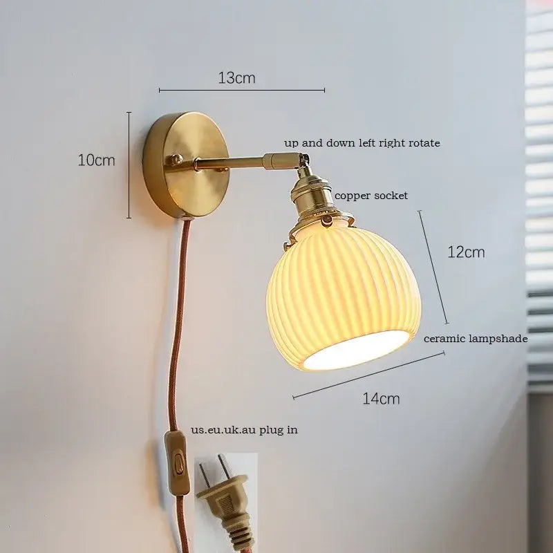 Brass ribbed decorbites ceramic wall sconce with adjustable iron arm and ribbed ceramic lampshade for bedroom lighting