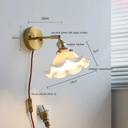 Vintage-style brass wall sconce with iron arm and ribbed decorbites ceramic lampshade for bedroom lighting
