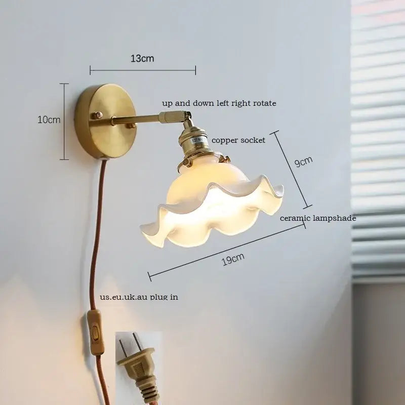 Vintage-style brass wall sconce with iron arm and ribbed decorbites ceramic lampshade for bedroom lighting