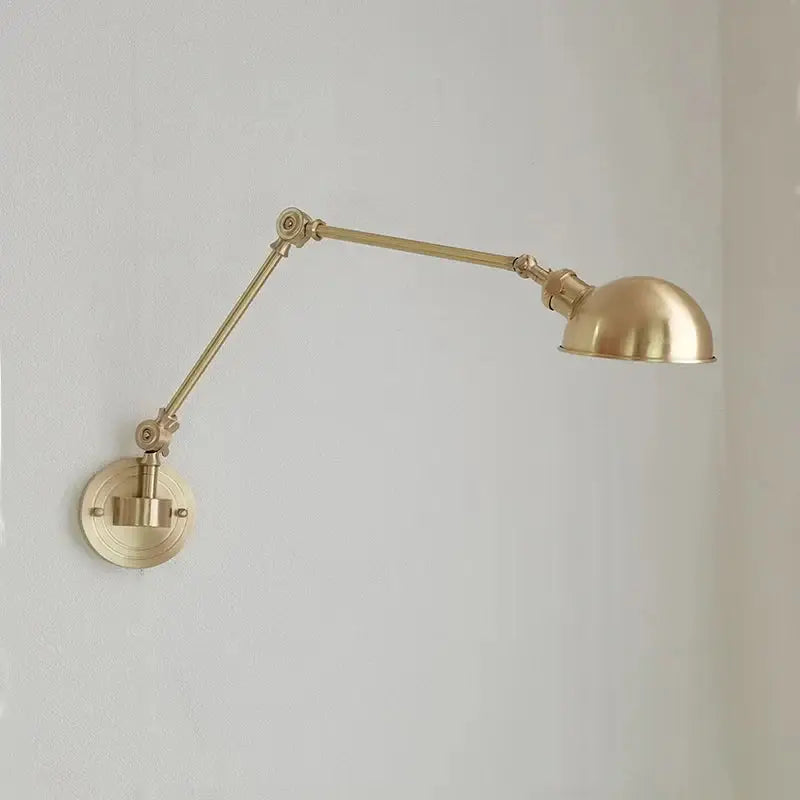 Brass wall lamp with adjustable articulated arm and dome shade featuring decorbites ceramic copper led design for bedroom sconce
