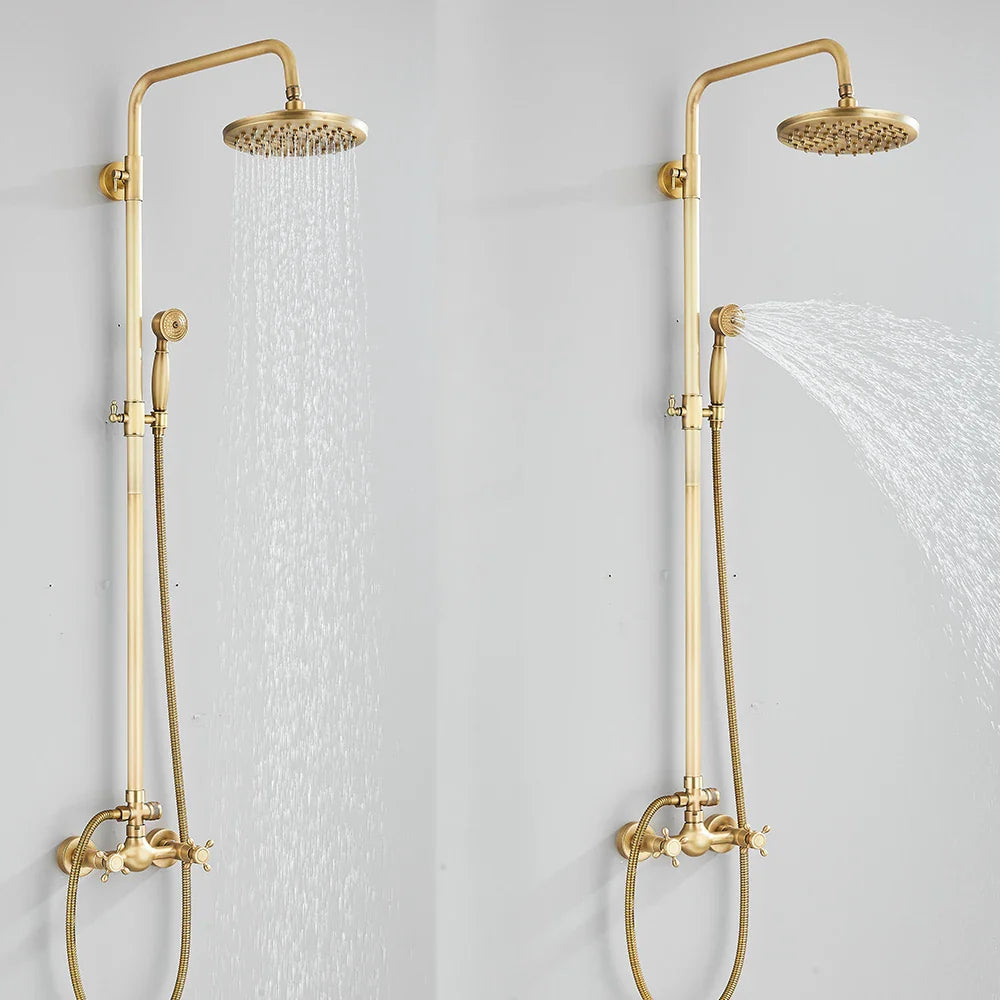 Brass shower faucet set wall mount with antique brass finish featuring fixed rainhead and adjustable handheld spray head