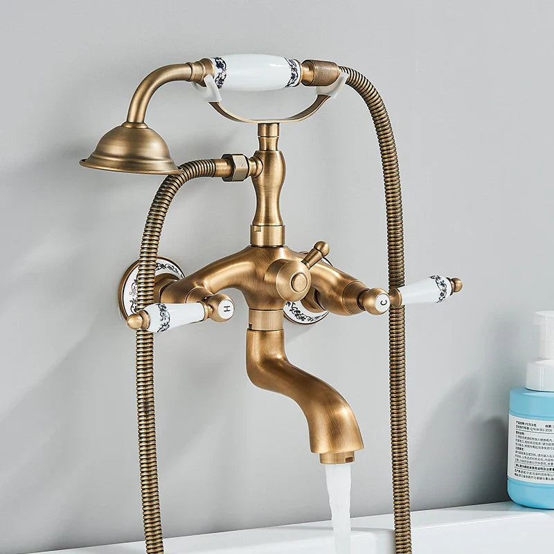 Antique brass shower faucet wall mount with white ceramic handles black floral patterns and cold water control