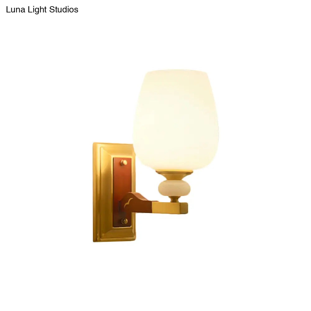 Brass Single Light Wall Mount Lamp with Opal Glass Cup Shape - Angled Wall Lighting Idea