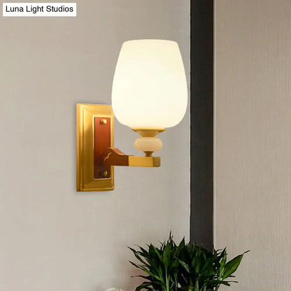 Brass Single Light Wall Mount Lamp with Opal Glass Cup Shape - Angled Wall Lighting Idea