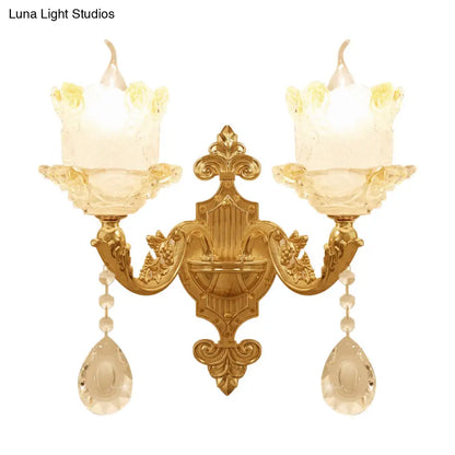 Brass Wall Mount Sconce with Scrolled Arms, Glass Blossom Shade, and Crystal Accents