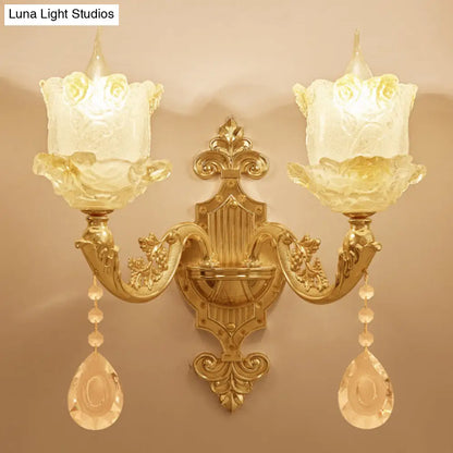 Brass Wall Mount Sconce with Scrolled Arms, Glass Blossom Shade, and Crystal Accents