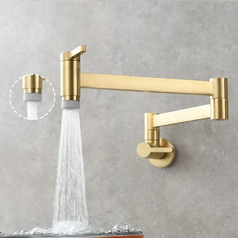 Brass wall mounted pot filler kitchen faucet with gold-colored articulated gooseneck and sleek metallic finish