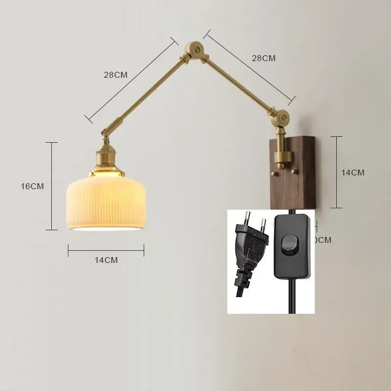 Brass and walnut copper swing arm led wall sconce with brass finish, ribbed cream glass shade, and wooden mounting plate