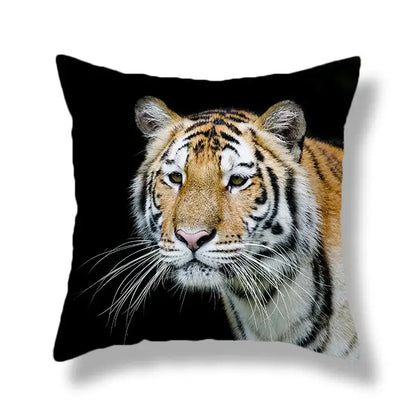 Black throw pillow with brave tiger pattern print featuring detailed orange and black tiger with white fur accents