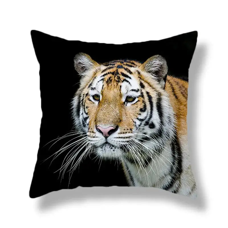 Black throw pillow with brave tiger pattern print featuring detailed orange and black tiger with white fur accents