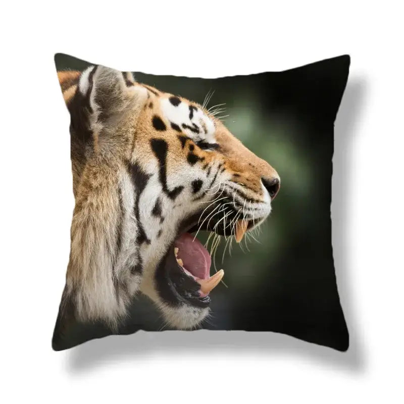 Square throw pillow with a vivid brave tiger pattern print of a yawning tiger against a dark background for living room decor