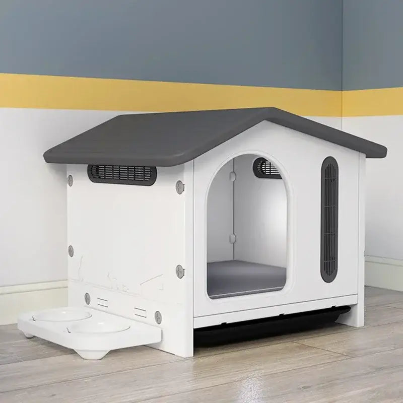 White and gray plastic breathable four seasons dog house with arched doorway ventilation slits and attached feeding tray