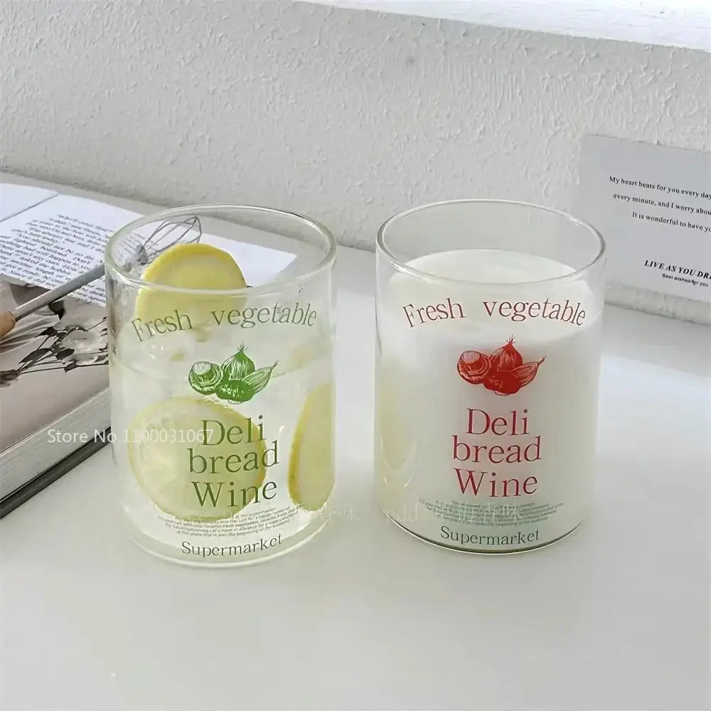 Clear glass coffee mugs with deli bread wine and vegetable prints including green onions and red peppers with straw
