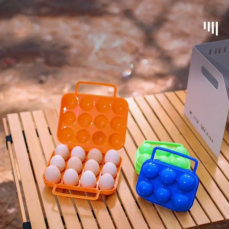 Orange plastic egg holder storage box with handle and compartments holding white eggs for kitchen storage