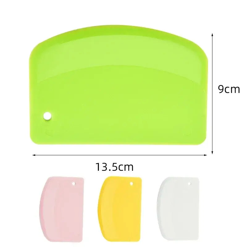 Bright lime green silicone cake spatula dough with rounded top and hole for hanging shown with pink yellow and white variants