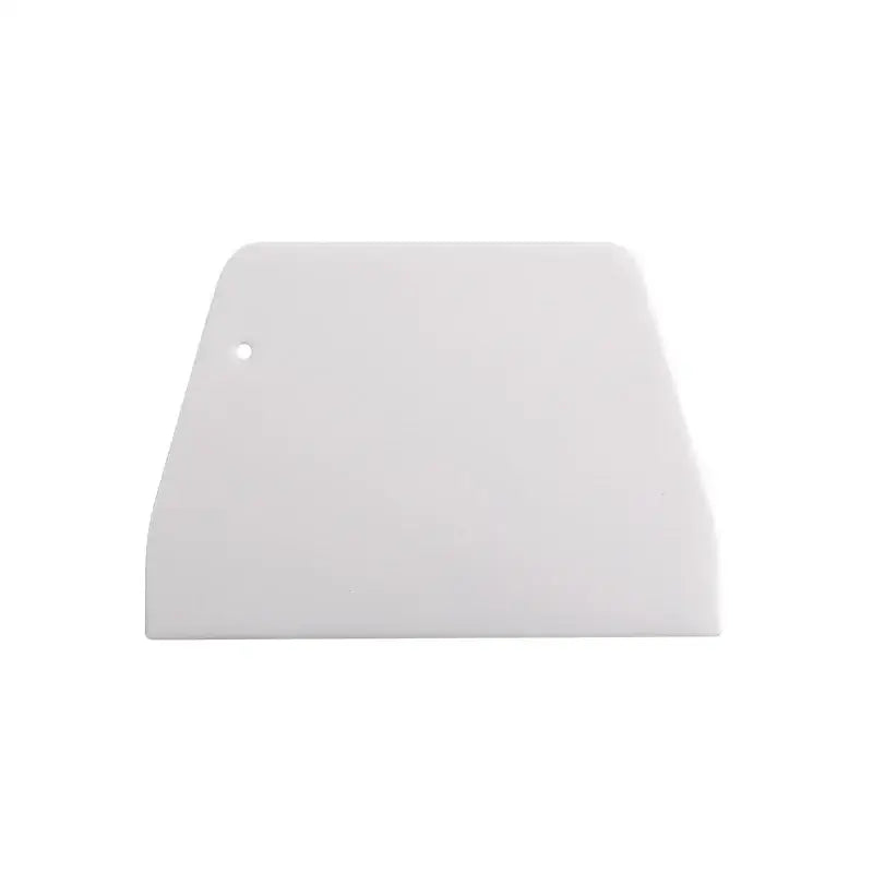 White plastic cake spatula dough scraper with rounded edge and hole for decorbites cake spatula dough use