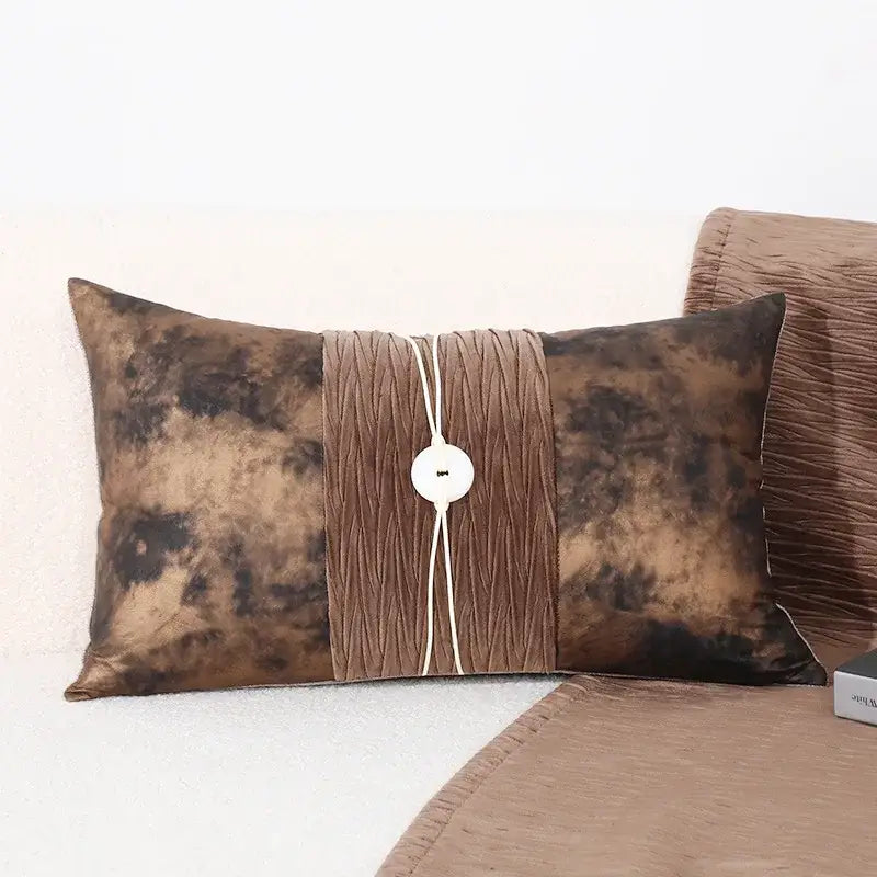 Brown tie-dye velvet Brighton cross stitch cushion cover with central pleated band and white button closure for living room