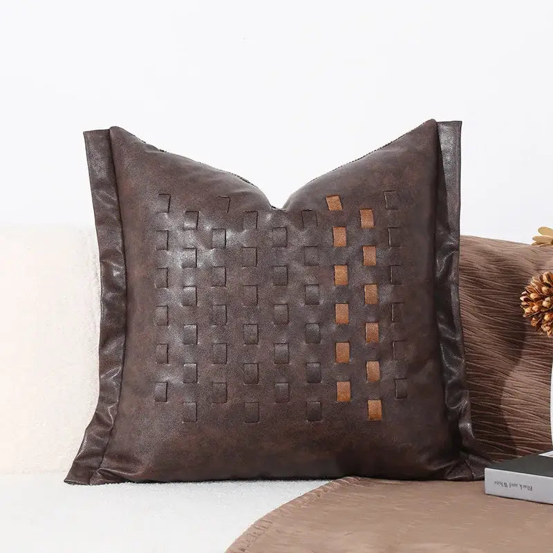 Brown leather Brighton cross stitch cushion cover featuring a woven pattern of darker and lighter brown rectangles