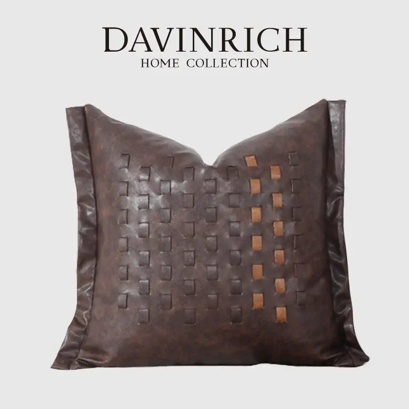 Dark brown leather cushion cover with woven brighton cross stitch pattern and tan rectangular accents for living room