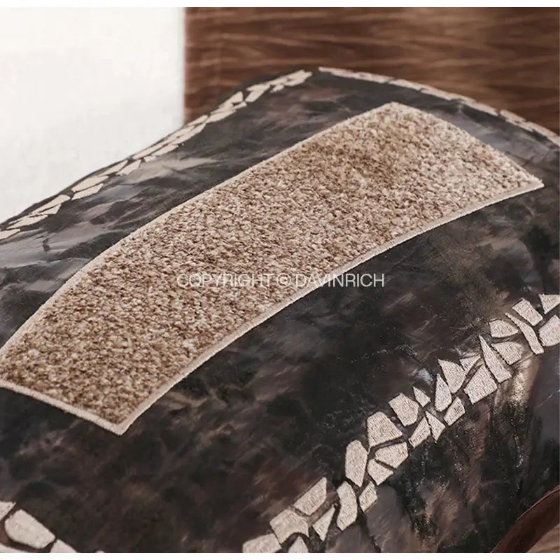 Dark brown faux leather brighton cross stitch cushion cover with textured beige fabric strip and white mosaic trim