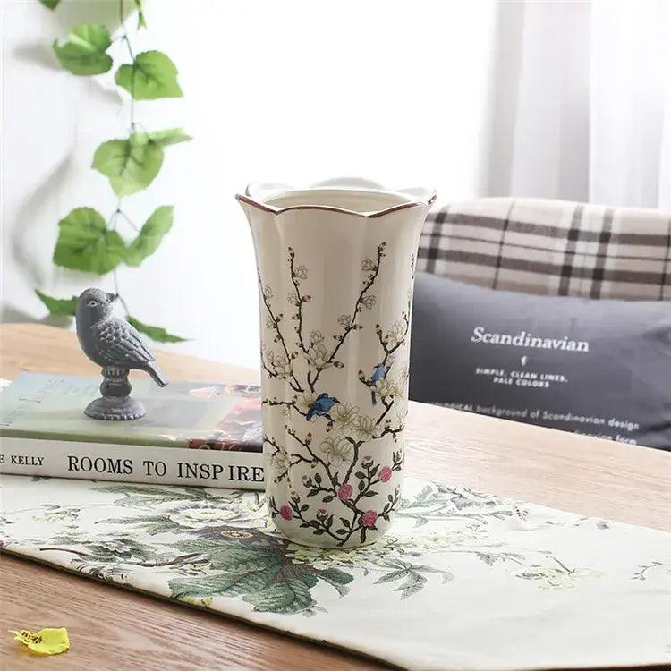 Cream-colored bird butterfly porcelain vase with delicate floral patterns and scalloped rim for living room decorbites decor