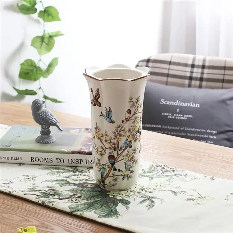 A cream-colored bird butterfly porcelain vase with hand-painted colorful birds on flowering branches for living room decorbites decor