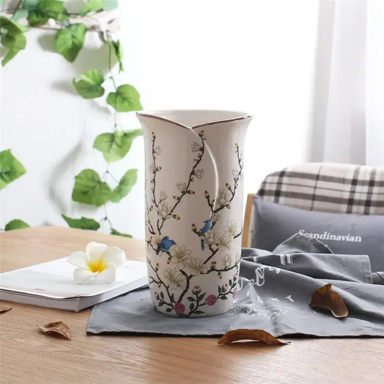A white bird butterfly porcelain vase with pink blossoms blue birds and brown branches for living room decorbites decor