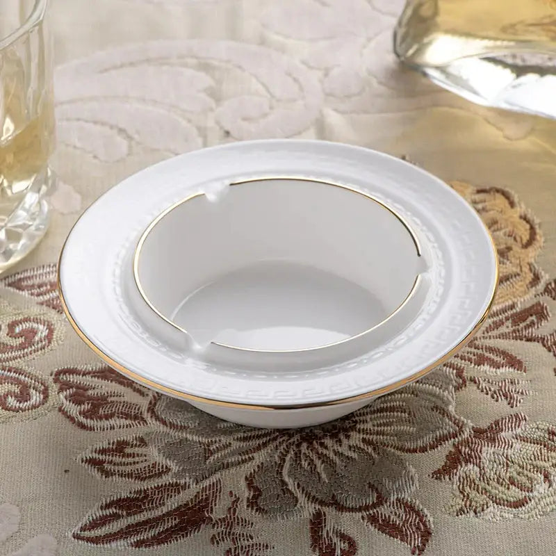 White ceramic ashtray with gold trim and decorative raised pattern from british white tea set by decorbites bone porcelain