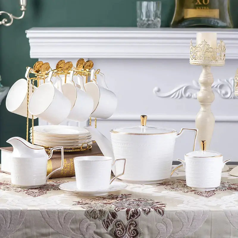 Elegant British white tea set with gold trim and subtle textured patterns in decorbites bone porcelain teaware