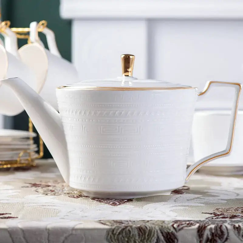 White ceramic teapot with gold trim and embossed geometric patterns from decorbites bone white tea set porcelain teaware