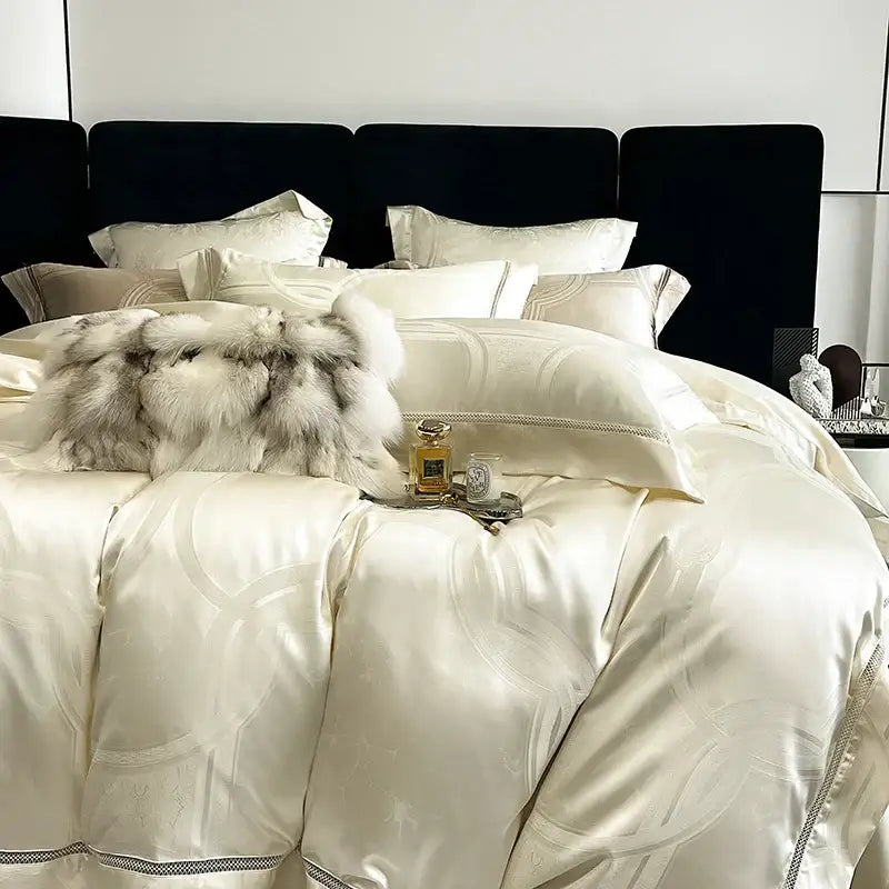 Cream-colored brocade satin jacquard bedding set with subtle geometric embroidery and plush white fur throw decorbites brocade satin