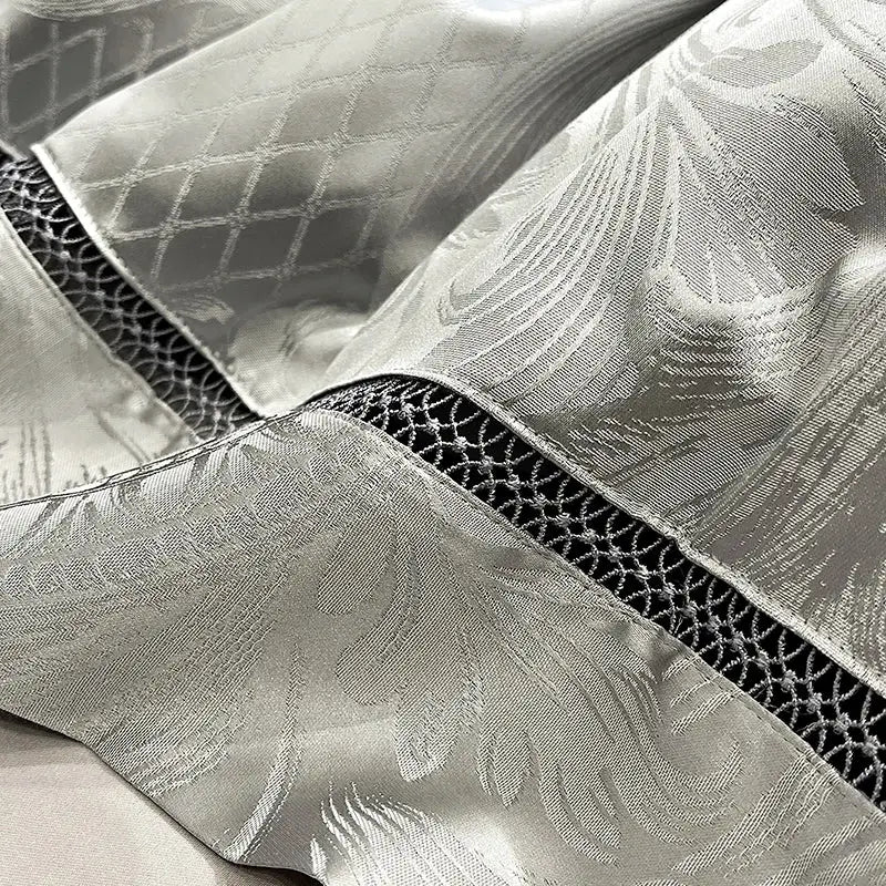 Silver satin bedding set with subtle floral pattern and black lace trim from decorbites brocade satin jacquard collection