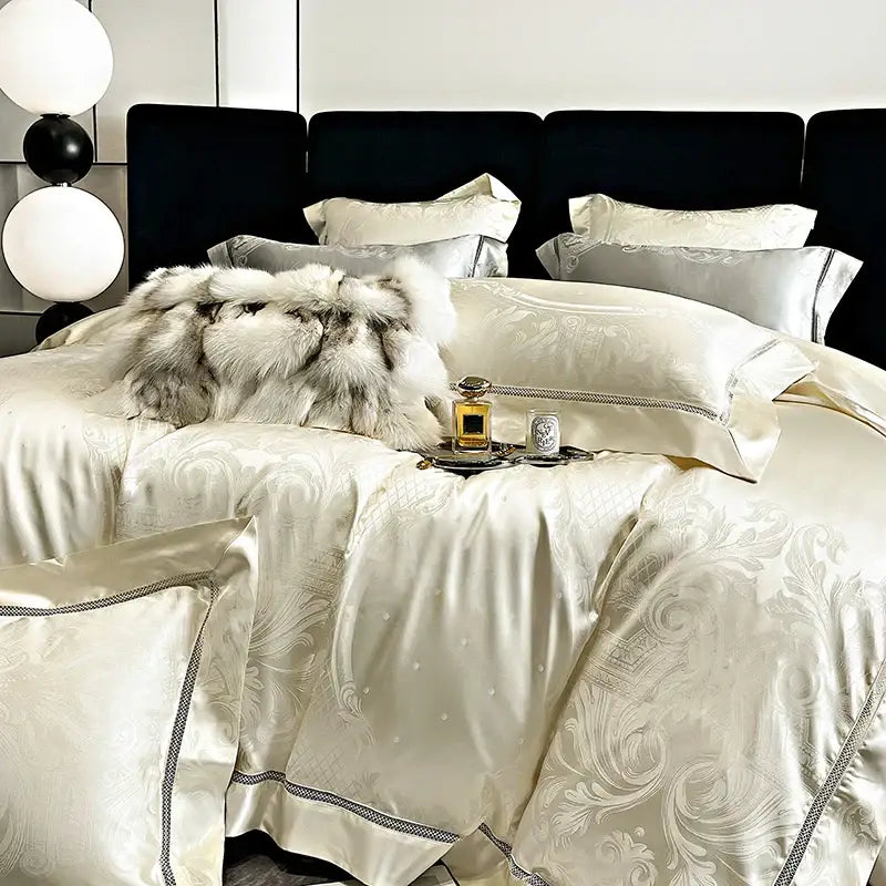 Cream-colored decorbites brocade satin jacquard bedding set with silver-toned floral embroidery and matching piping