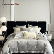 Silver satin bedding set with intricate damask embroidery and black piping decorbites brocade satin jacquard design