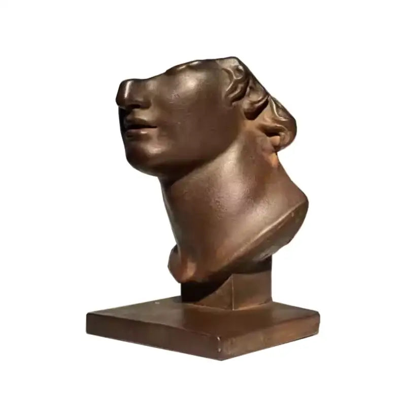 Bronze abstract human face sculpture with stylized hair on square base perfect for living room decorbites abstract human art decor