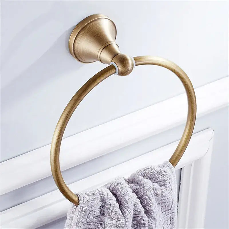 Antique brass-finished circular towel ring with minimalist design in decorbites bronze bathroom accessories set