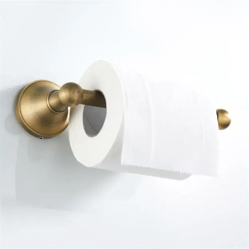 Antique brass toilet paper holder with sleek curved design and polished finish in decorbites bronze bathroom accessories set