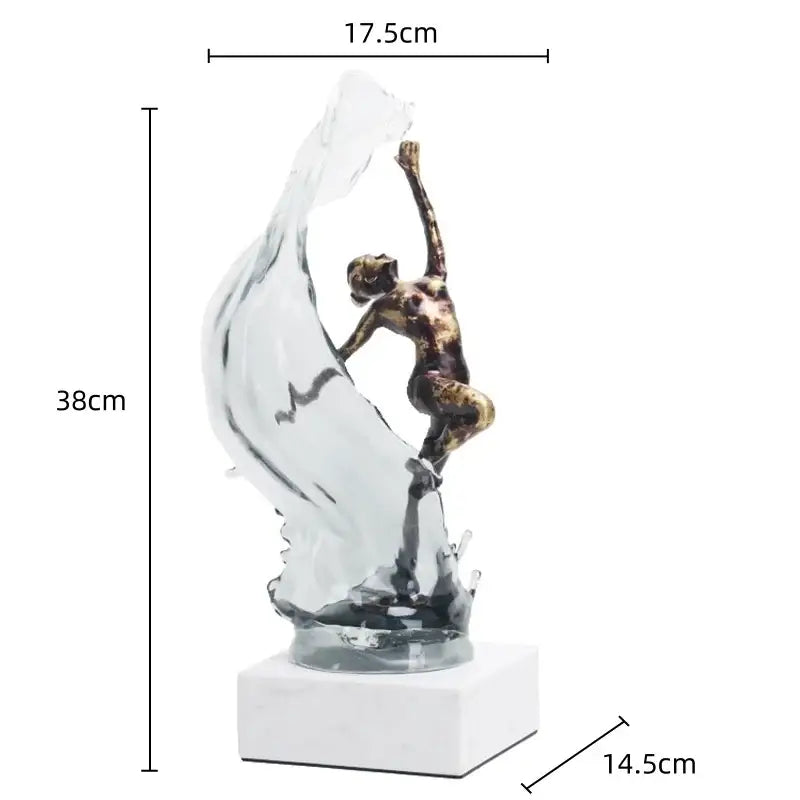 Bronze ballet dancer figure with glass fabric effect in mid-leap for elegant home decor display