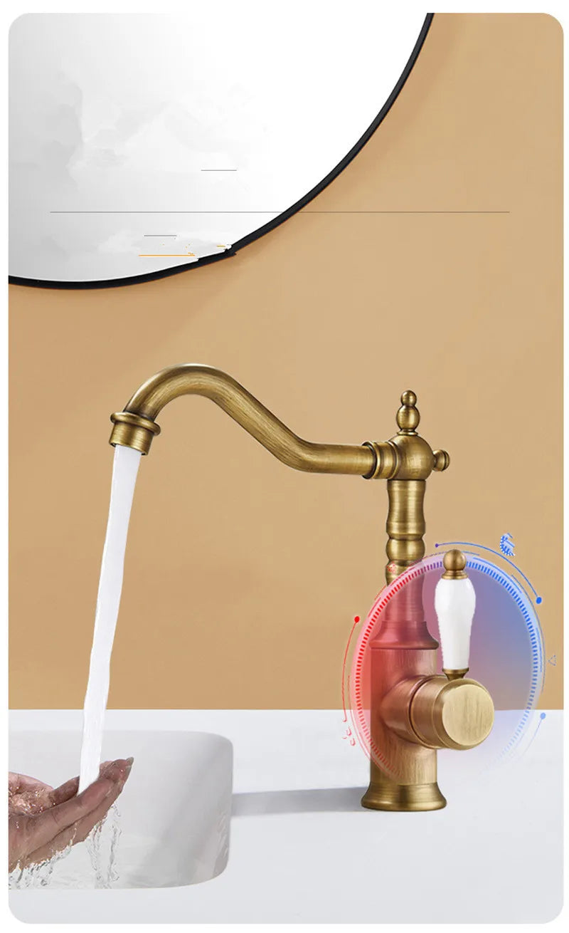Antique brass-finished bronze basin faucet with curved spout and white ceramic handle for cold water use
