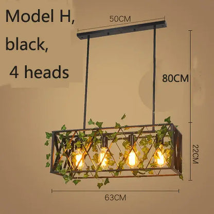 Black metal decorbites birdcage pendant lights with four exposed bulbs and green ivy vines for dining room decor
