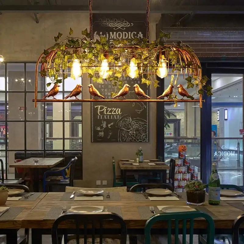 Bronze birdcage pendant lights with wrought iron, artificial green ivy, five ornamental birds, and exposed filament bulbs for dining room decorbites birdcage pendant