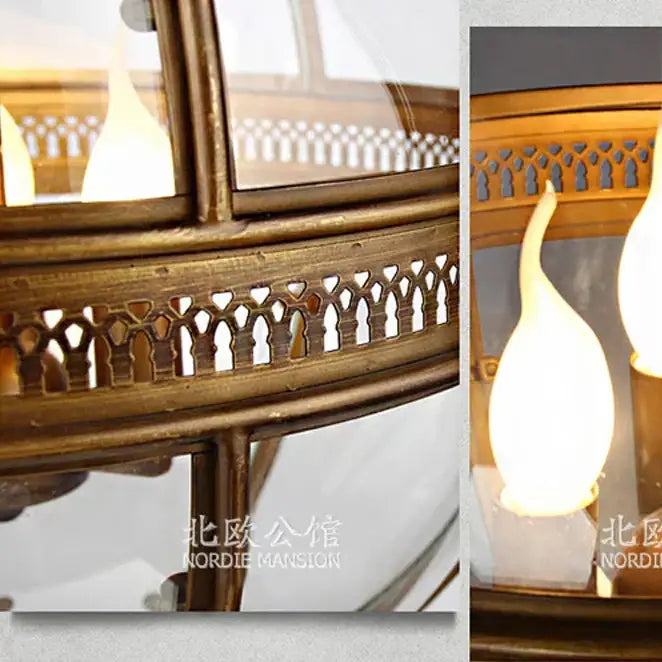 Antique brass lantern with intricate gothic cutouts and warm interior lights in decorbites bronze black glass globe chandelier foyer light