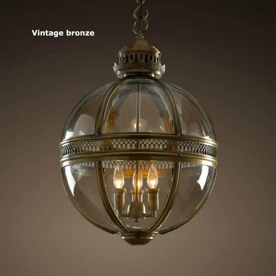 Vintage bronze black glass globe chandelier foyer light with spherical pendant and ornate metalwork decorbites bronze black