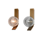 Pair of bronze wall sconce lamps with brass finish and translucent bubble glass spheres for bedroom use