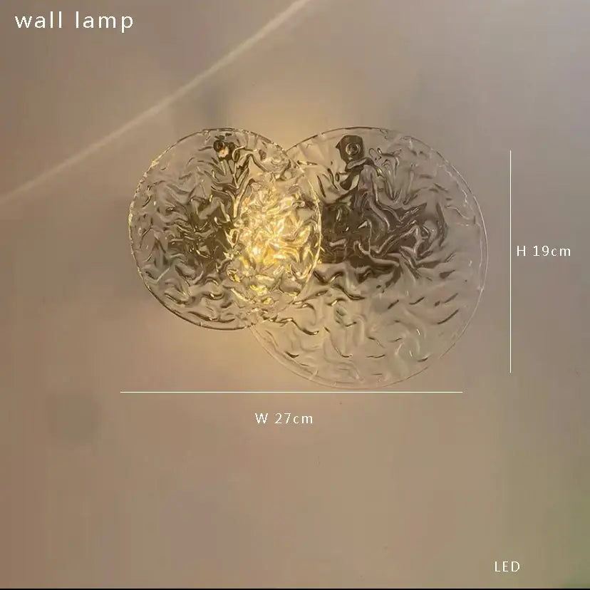 Bronze bubble glass wall sconce lamps with clear textured glass and warm led light for bedroom use