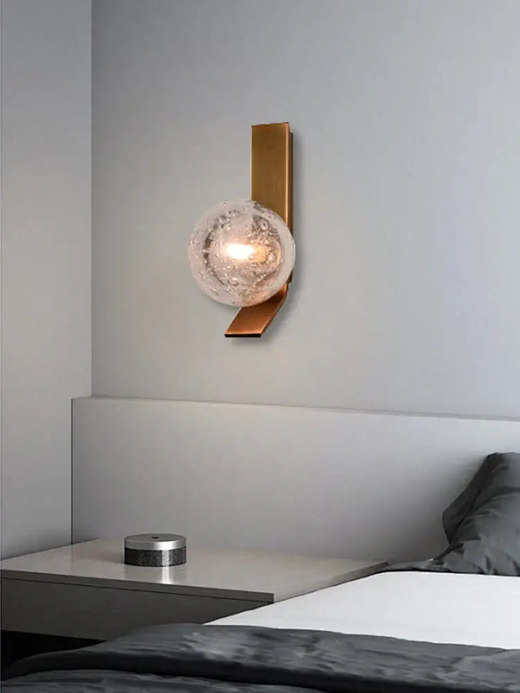 Gold-toned wall sconce lamps with textured frosted glass globe in bronze bubble glass wall sconce lamps bedroom pair